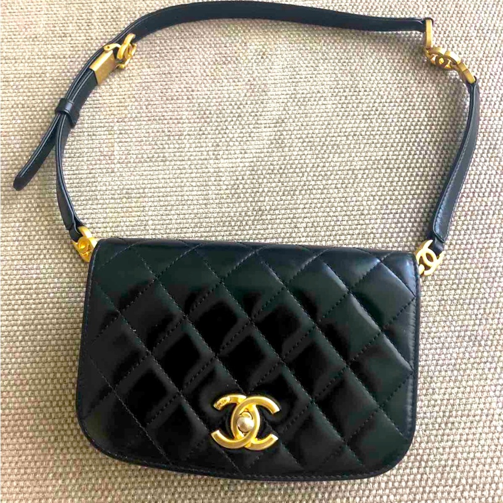 Chanel Quilted Lambskin Waistbag in Black.